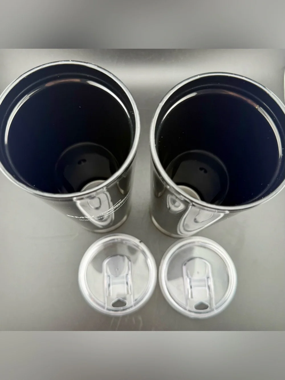 2 New BMW of Sarasota drink tumblers with sealed lids. 22oz